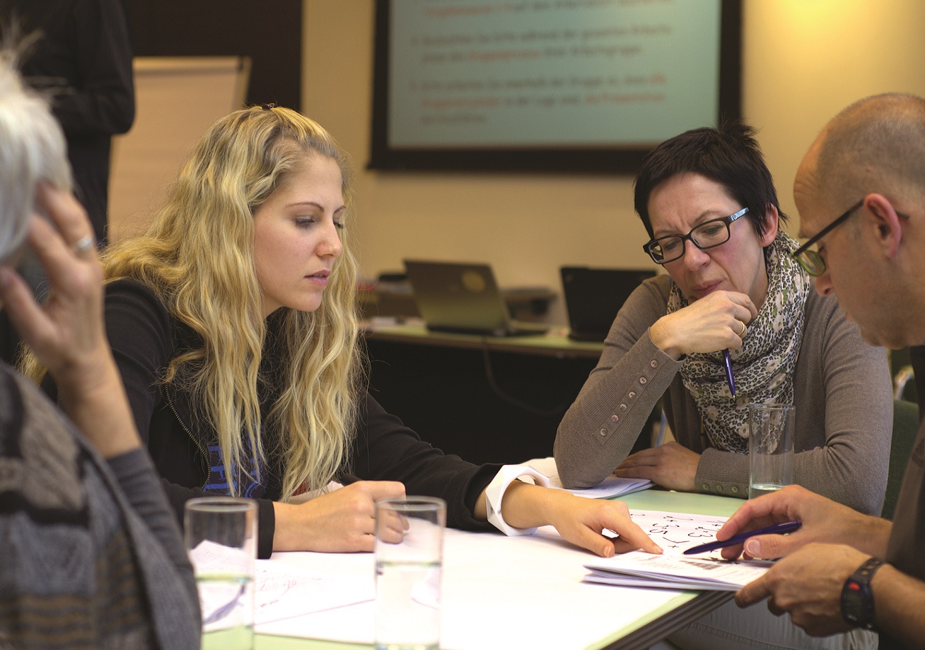 Group meeting for live conversation in the workplace